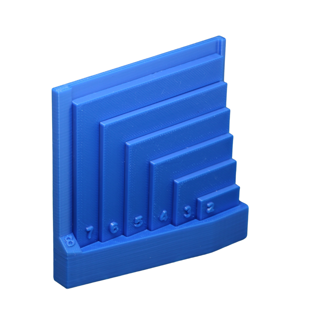 Quiltquadrate - mit integriertem Blauer Puffer mit mehreren gestuften, rechteckigen Aussparungen für Werkstoffe.